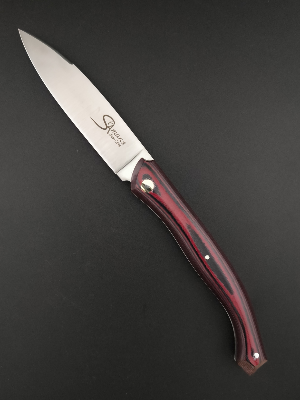 Le couteau Saint-Amans-des-Cots Micarta lin rouge et noir